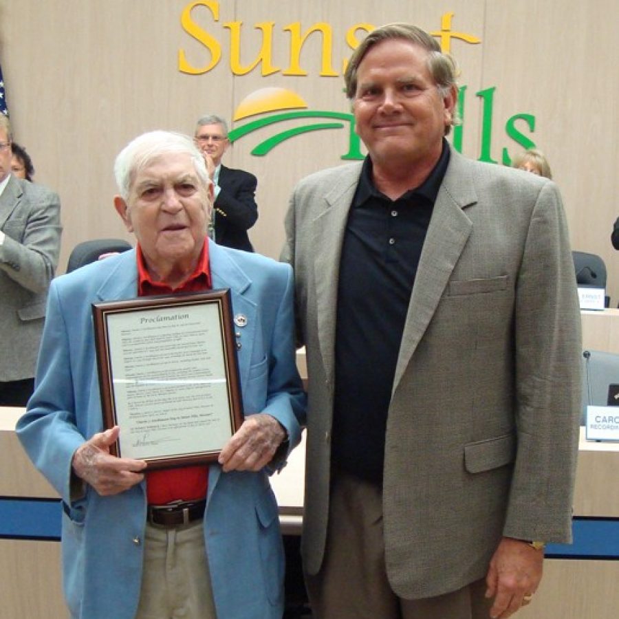 Charles J. Stockhausen, left, is honored by then-Sunset Hills Mayor Mark Furrer with 'Charles Julius Stockhausen Day.'