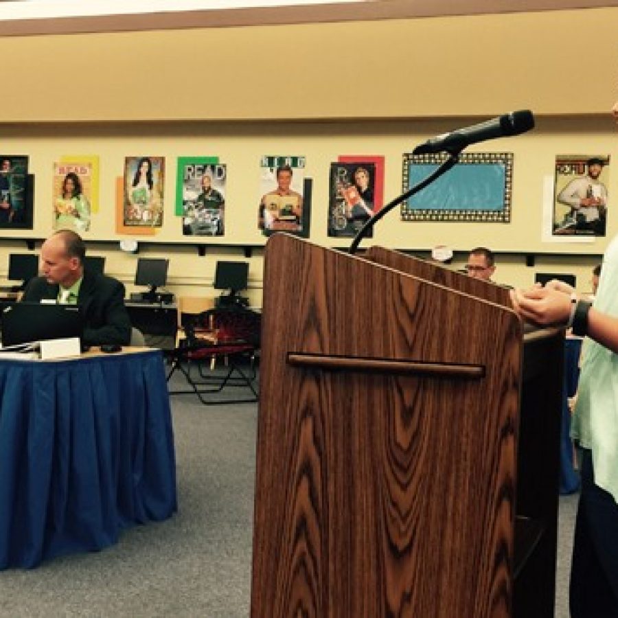 MHS senior Anna Herman tells the Board of Education that block scheduling is key to her academic success Aug. 11. Pictured to the left are board member Kevin Schartner and Superintendent Chris Gaines.