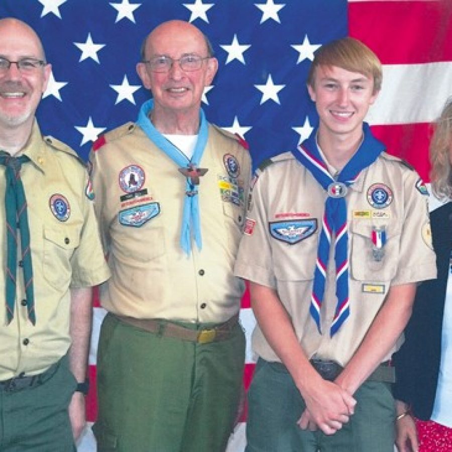 Daniel Blake Cormack recently attained the rank of Eagle Scout. He is pictured with his parents, Christopher Cormack, left, and Karen Cormack, right. Also pictured is Tony Dill of the Gravois Trail Eagle Scout Association.