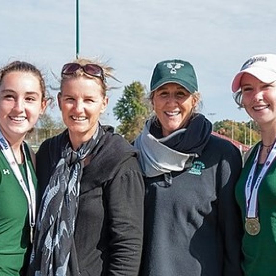 Lindbergh High School sisters Kat, far left, and Alex, far right, Rosenberger celebrate their Class 2 State Doubles Championship last year with their mother, Noel Quevreaux, middle left, and Shannon Cook. Quevreaux and Cook teamed up to win Lindberghs last doubles tennis title in 1984. The Rosenberger sisters finished sixth at state this year. 