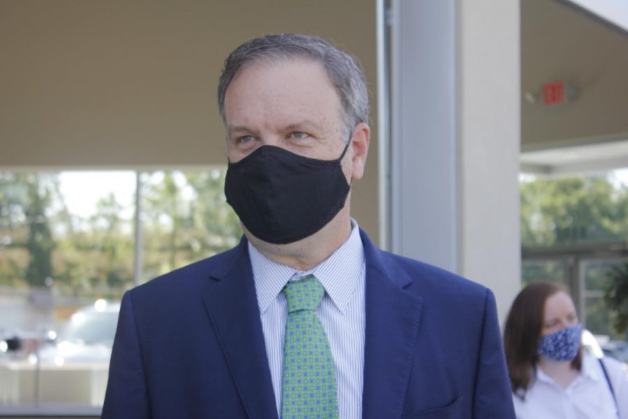 County Executive Sam Page appears in a mask at the July 2020 ribbon cutting for 9 Mile Garden food truck plaza in Affton.