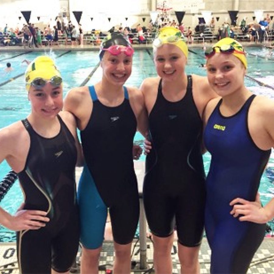 FASTs Ozark swimming 13-14 girls 800-M Free Relay and 200-M Medley Relay record-holders, from left, are: Emily Traube, Eleni Kotzamanis, Sophia Burwitz and Maddy Rey.