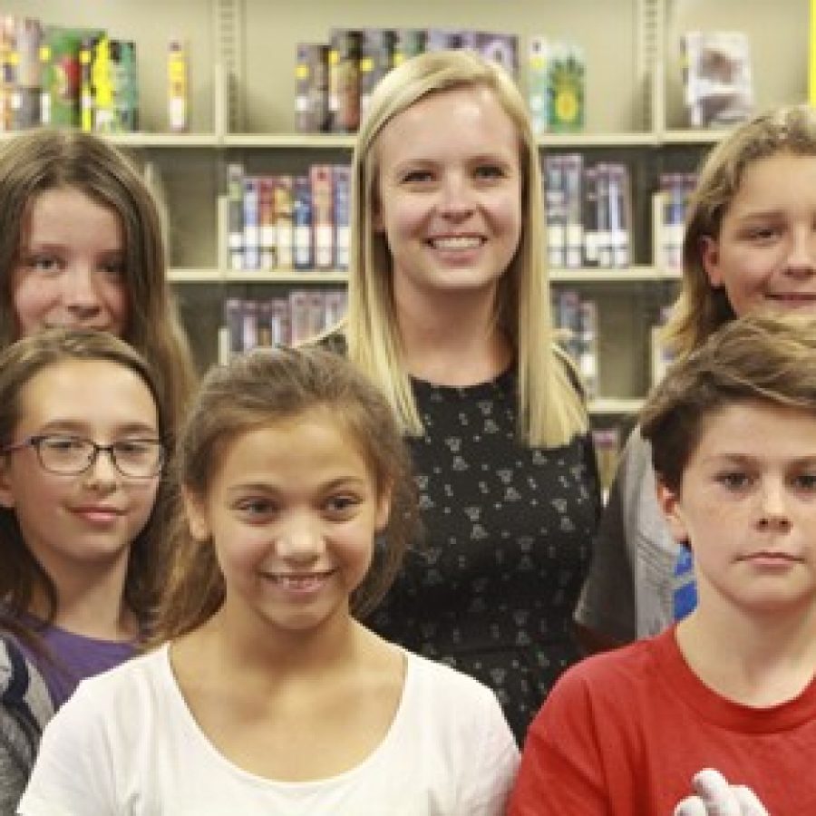 Truman Middle School library media specialist Megan Vallis, center, is one of six 2017-2018 Missouri Teacher of the Year finalists.
