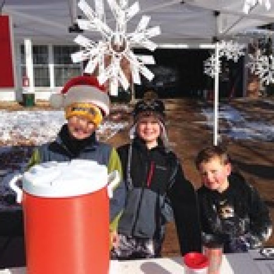 Three brothers who attend Kennerly Elementary School recently hosted a hot cocoa stand that raised more than \$1,500 for Assumption Parishs St. Vincent DePaul Society. Pictured, from left, are: Brock, Chase and Drew Barger, who are in fourth grade, third grade and kindergarten, respectively. 