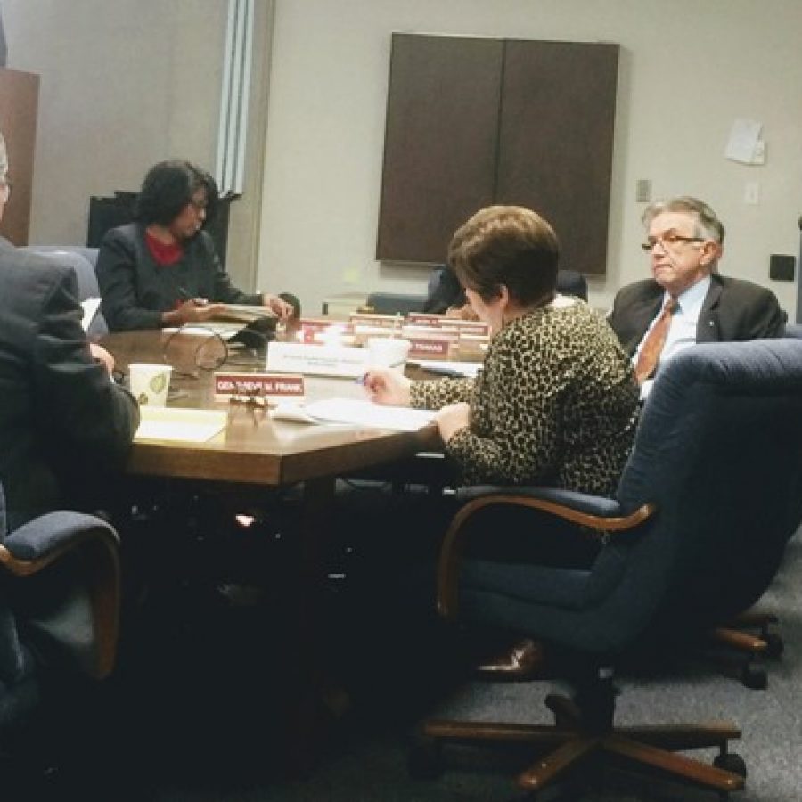 County Counselor Peter Krane, left, responds to a series of questions from 6th District Councilman Ernie Trakas, R-Oakville, right, after the March 7 council caucus. Also pictured are 4th District Councilwoman Rochelle Walton Gray, D-Black Jack, and County Clerk Genevieve Frank.