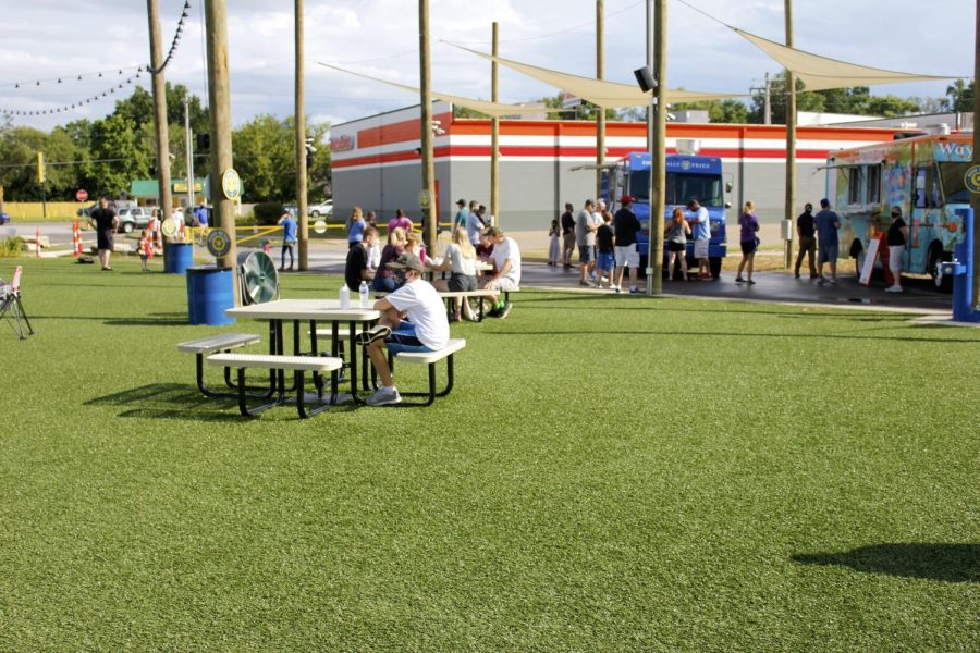 Dinner-goers visit 9 Mile Garden, a food truck garden in Affton, in July 2020. 