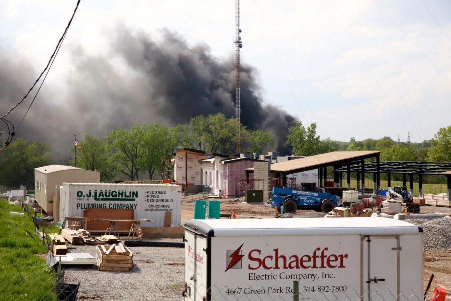 A fire at Manor Chemical Company plant, 6901 Heege Road, as seen from the new Tower Tee facility currently under construction, Thursday, April 29. The four-alarm chemical fire forced evacuations of residents near the plant, but the fire was fully contained by the end of the day and residents were able to return to their homes that evening. 