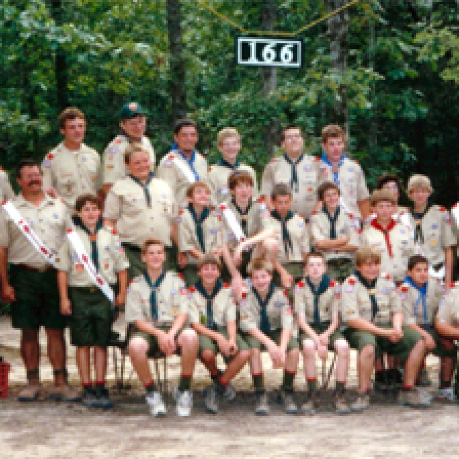 Members of Boy Scout Troop 166 of Oakville are writing cards and filling holiday gift bags with needed items for U.S. soldiers serving in Iraq.