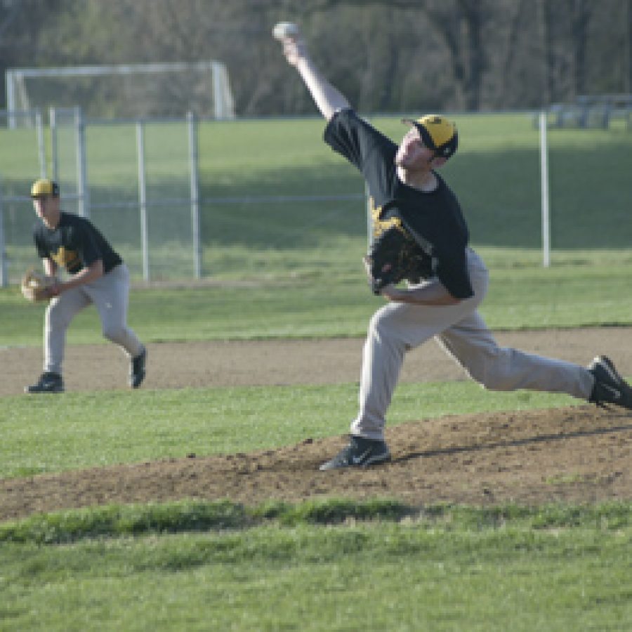 Bill Milligan photo
Winning pitcher Matt Pressler of Oakville releases a fastball Friday on his way to his first victory of the season.