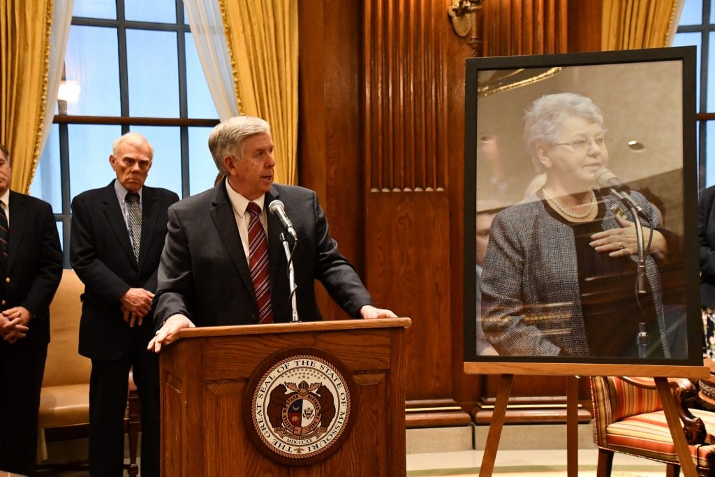 Gov. Mike Parson, above, hosted the largest crowd in his office so far to see him sign a bill renaming Lindbergh for the late Rep. Cloria Brown.