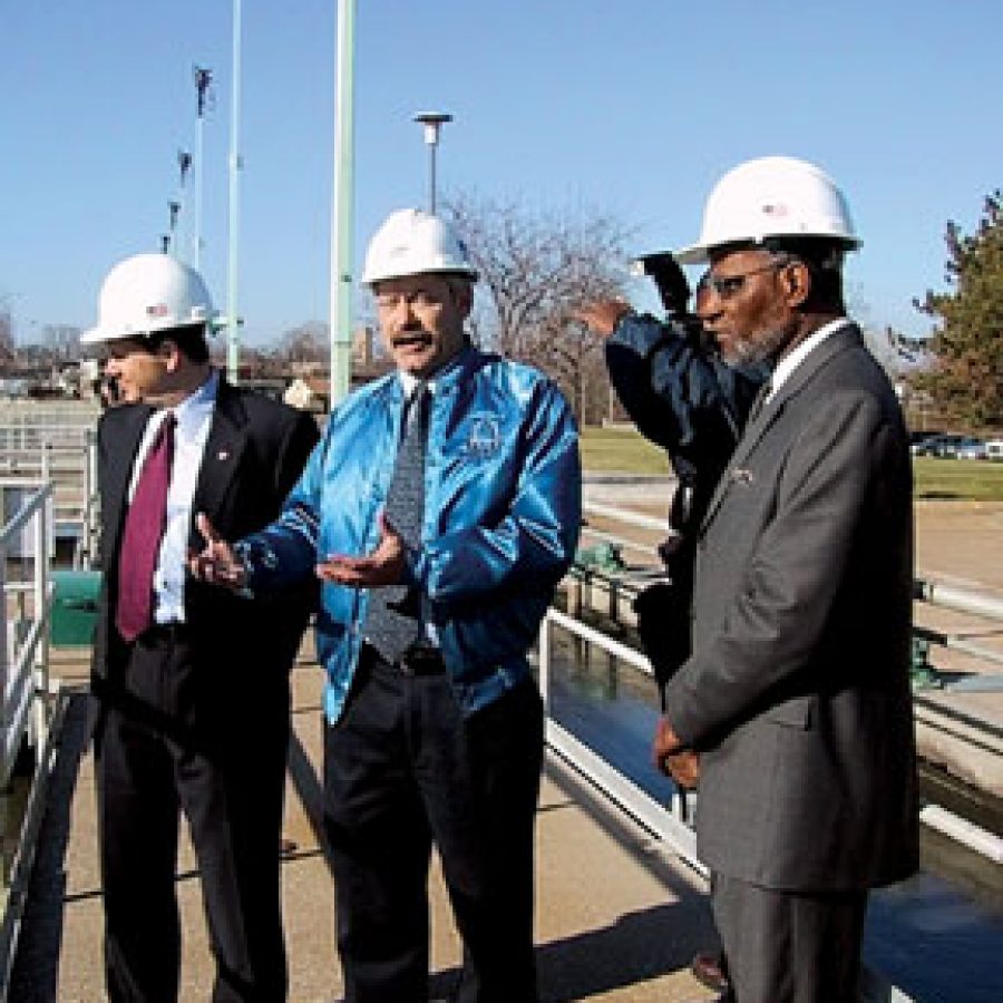 Mayor Francis Slay, left, Metropolitan St. Louis Sewer District Operations Division Manager Neil Frankenberg, center, and County Executive Charlie Dooley discuss the Lemay Wastewater Treatment Plant odor problems during the Proposition Y campaign kickoff. Increased odor control is just one of the improvements that would be implemented at the south county facility upon voter approval of Proposition Y Feb. 3, according to Frankenberg.  
Alyson E. Raletz photo
 
