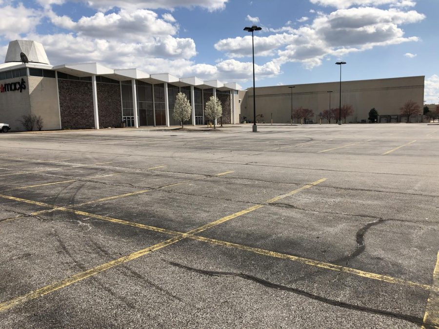Some businesses were forced to close by St. Louis County's March 21 stay-at-home order, but others like the Macy's at South County Center, seen above during the stay-at-home order, voluntarily closed before that. 