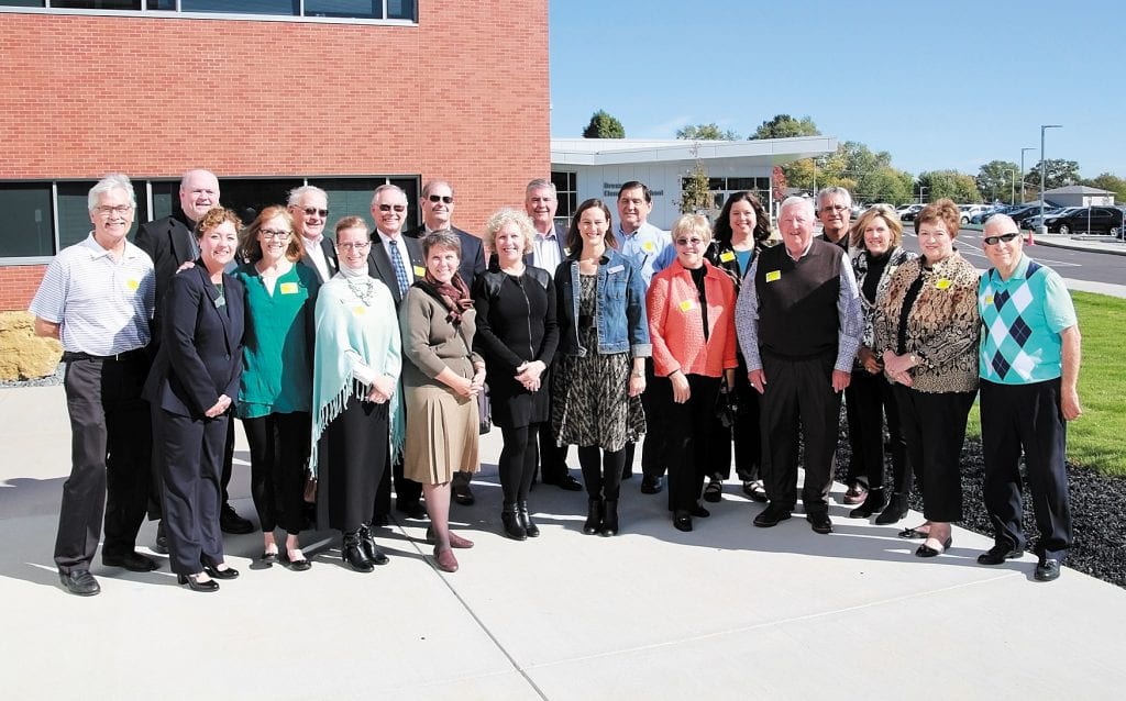 Current and former Lindbergh Board of Education members attending the annual luncheon for former school board members, back row, from left, are: Donovan Larson, current Treasurer Mike Tsichlis, Phil Carlock, Vic Lenz, James Eager, Barry Cooper, Larry McIntosh, Vicki Lorenz Englund, Ken Fey and Janine Fabick. Front row, from left, are: current board member Christy Watz, Marla Dell, current President Karen Schuster, Katie Wesselschmidt, Kathy Kienstra, current Vice President Jennifer Miller, Glenda Finnie, retired Superintendent Gary Wright, Joyce Brockhaus and Don Bee.