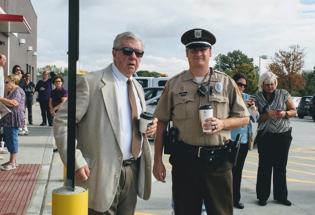 Green Park Officer Jeremy Hake, right, with Mayor Bob Reinagel at the ribbon-cutting ceremony of the new McDonald's earlier this month. Photo by Gloria Lloyd.