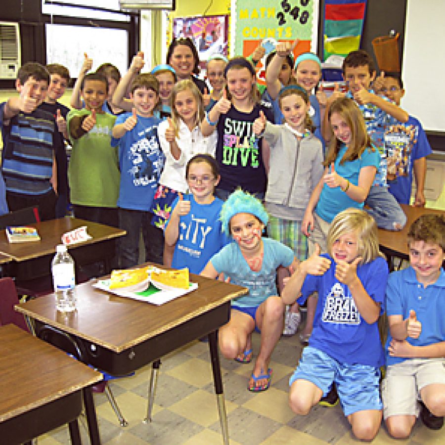 Truman Elementary School students wore blue and donated change in honor of their friend Jacob Swiderski, who is undergoing treatment for a cancerous brain tumor. The \Jingles for Jacob\ day alone raised more than \$5,000.