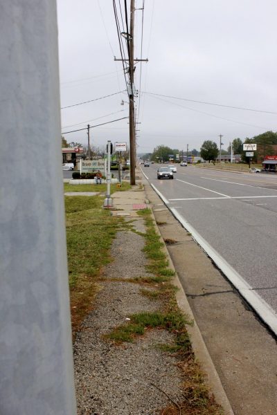 Utility poles bisect the narrow sidewalks on the west side of Lemay Ferry Road in October 2020, presenting issues for those who use wheelchairs or have other mobility concerns.  The east side of Lemay Ferry has accessible sidewalks, but for anyone on the west side, the only way to reach the accessible east sidewalk is by directly crossing the street, or riding in the street next to the burn to the closest crosswalk at Victory Drive. 