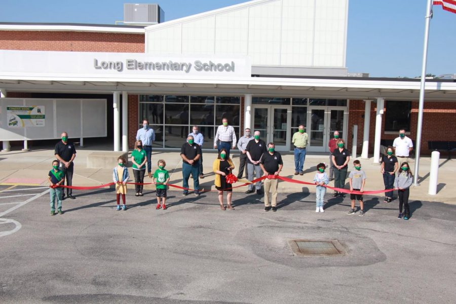 The ribbon cutting for the secure vestibule at Long Elementary School. 