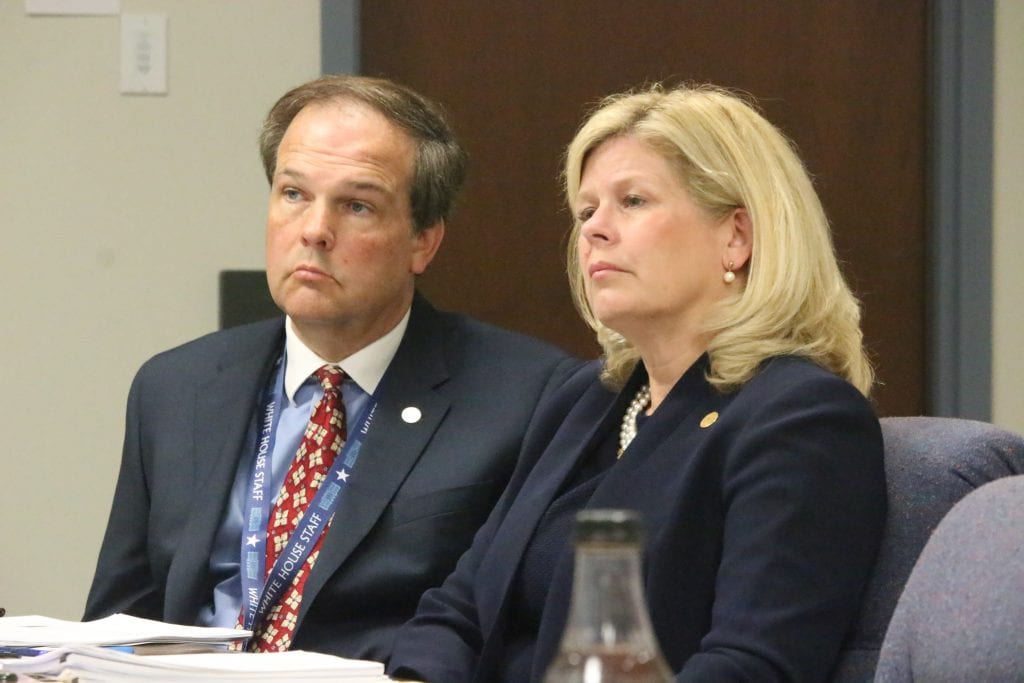 Council members Mark Harder and former Councilwoman Colleen Wasinger listen to then-Councilman Sam Page speak during a Ethics Committee meeting in 2024.