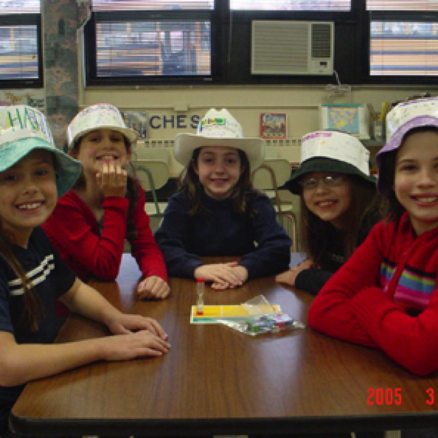 Sporting their award-winning hats are The Math Hatters\ Equations team, comprised of, from left, third-graders Rose Black, Natalie Mayer, Alex Griffin, Lauren Goskie, and Brenna Kizer.