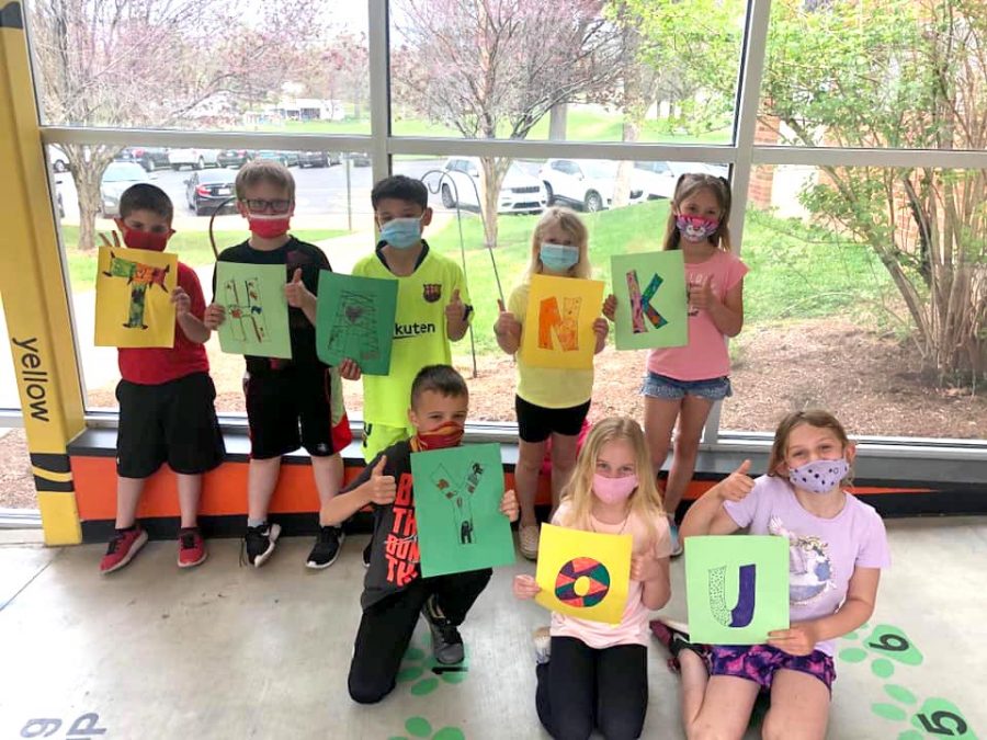 Students at Wohlwend Elementary held up thank-you signs for Mehlville School District voters the day after Mehlville’s first bond issue since 1992, Proposition S, passed April 6, 2021. The money will fund a new secure entry at all schools.