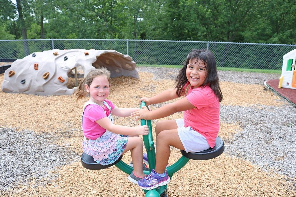 Mehlville’s John Cary Early Childhood students Emma Kitchell and Yaneli Juarez-Carrillo check out their playground the first week at school in 2018.