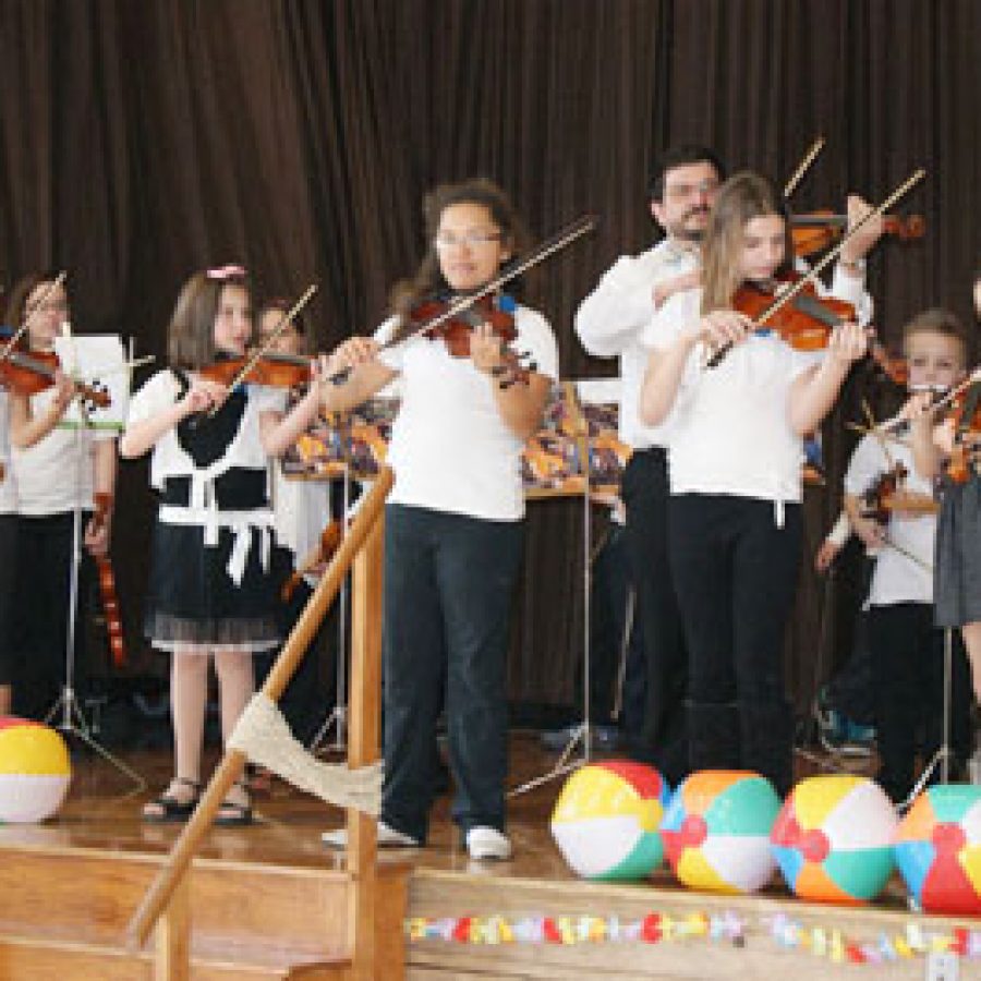 Bierbaum Elementary School strings students perform for nearly 120 60plus Club members at Bierbaums Beach Bash.