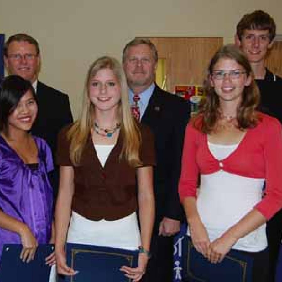 National Merit Commended Students, front row, from left, are: Dong-Nghi Huynh, Kira Klein and Kristen Miller. Back row, from left, are: Superintendent Terry Noble, Diehl and Michael Wisely.
