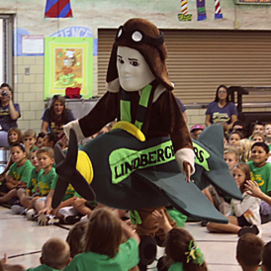 Students cheered and gave high fives as Lindberghs new mascot, Lucky Lindy, flew through the Kennerly Elementary School gym Aug. 19.