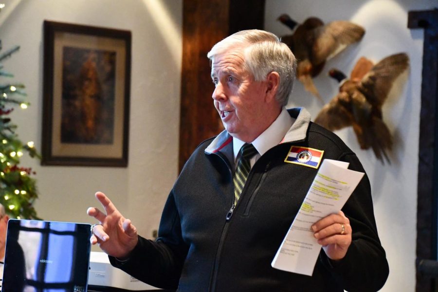 Gov. Mike Parson tweeted this photo of himself without a mask speaking to a group of mostly maskless Republican senators in November 2020, including Sen. Andrew Koenig and Sen. Paul Wieland. 