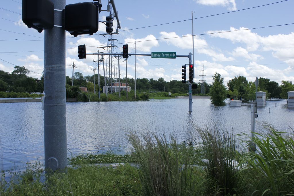 River+City+Boulevard%2C+at+the+intersection+of+Lemay+Ferry+Road%2C+is+inaccessible+due+to+rising+floodwater+from+the+River+des+Peres+Thursday%2C+May+30.+The+Mississippi+River%2C+which+backs+up+into+the+River+des+Peres%2C+is+expected+to+crest+Saturday.