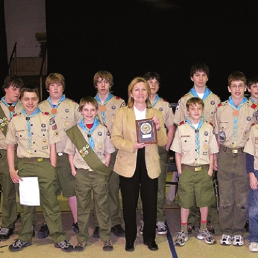 Members of Boy Scout Troop 661 who participated in the troops 40th anniversary celebration, back row, from left, are: Nathan Vancil, Kevin Lieb, Sean Jones, Eric Ege Jr., Austin Chambliss and Tyler Wolk. Front row, from left, are: Rob Mitchell, Sean Chambliss, Point Elementary Principal Nancy Zitzmann, Eric Mangels, Austin Karpel and Sam Ranzetta.