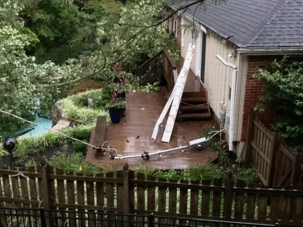 A tree fell on a pool in St. Louis County in storm damage Monday, Aug. 10, 2020.