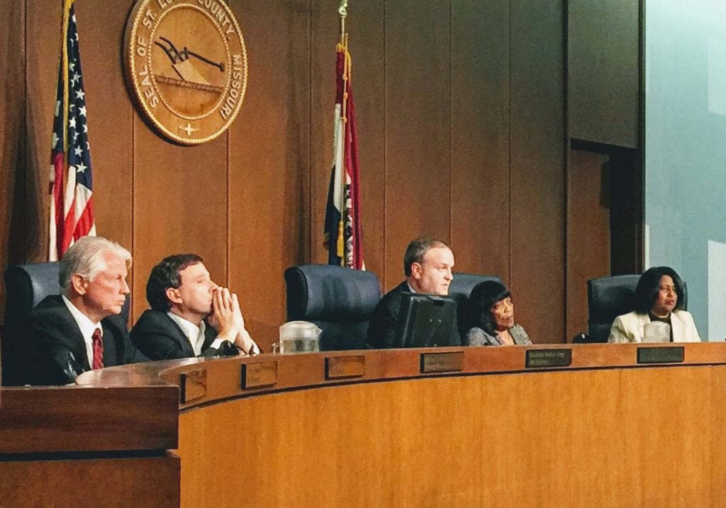 County Executive Steve Stenger, second from left, listens to Rep. Bob Burns, D-Affton, address the council last year, left to right: 5th District Councilman Pat Dolan, D-Richmond Heights, Chairman Sam Page, D-Creve Coeur, 1st District Councilwoman Hazel Erby and 4th District Councilwoman Rochelle Walton Gray, D-Black Jack. Photo by Gloria Lloyd.