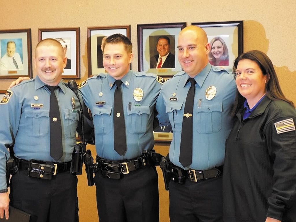 Sunset Hills Police Chief Stephen Dodge last week awarded his Police Department’s highest honor, the Chief’s Commendation for Valor, to Officer Chris Medlock, left, along with awards to, from left, Sgt. Jeff Senior, Officer Tim Guenther and Communications Officer Mary Ebeler for their roles in a high-speed chase and shootout in August. 