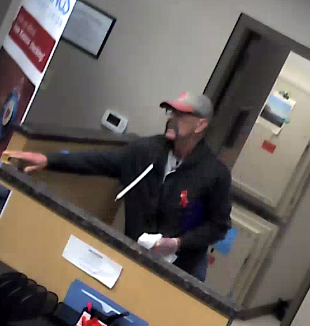 Police release photos of armed and dangerous Concord bank robbery suspect