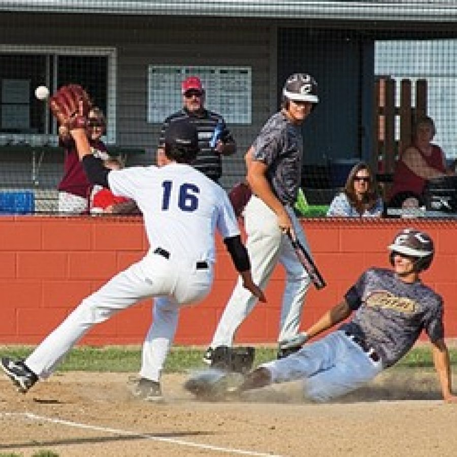 Ryan Brady, No. 16, of the Dirtbags attempts to put the tag on a Capitals runner in Fridays game.  