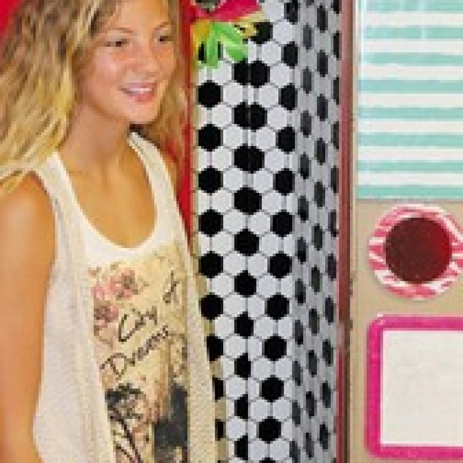 A new school year is underway in the Mehlville School District. Classes began Aug. 14, but students at Oakville Middle School showed up bright and early, one day early, to decorate their lockers. Above, seventh-grader Jordan Beseda is pictured with her decorated locker. 