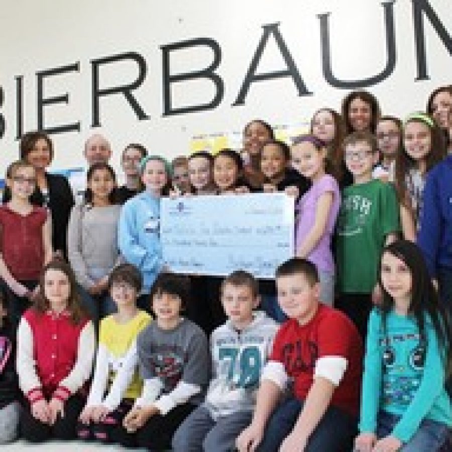 Bierbaum Elementary Student Council members raised \$694 by selling 10-cent candy canes in school before the holidays. 