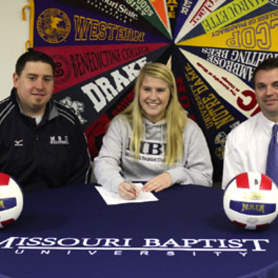 Lindbergh High School senior Mary Allison Krus, who signed a letter of intent to play volleyball for Missouri Baptist University next year, is pictured with head coach John Yehling, right, and assistant coach Chris Nichols.