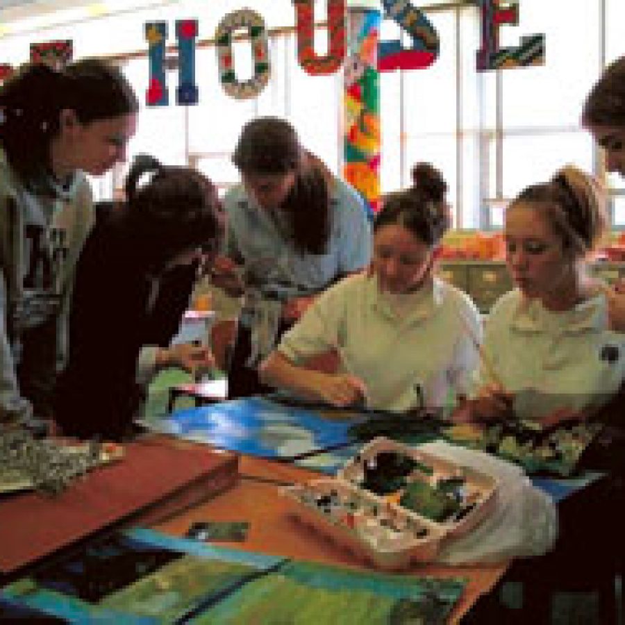 Notre Dame High School students, who come from the entire St. Louis region, work together on an art project under the guidance of Sister Phyllis Ann Price. Pictured, from left, are: Elizabeth Eveker, Chelsea Booker, Carolyn Flood, Theresa Dineen, Sandy Inman, Marisa Chirco and Heather Ebert.
Char Mason photo