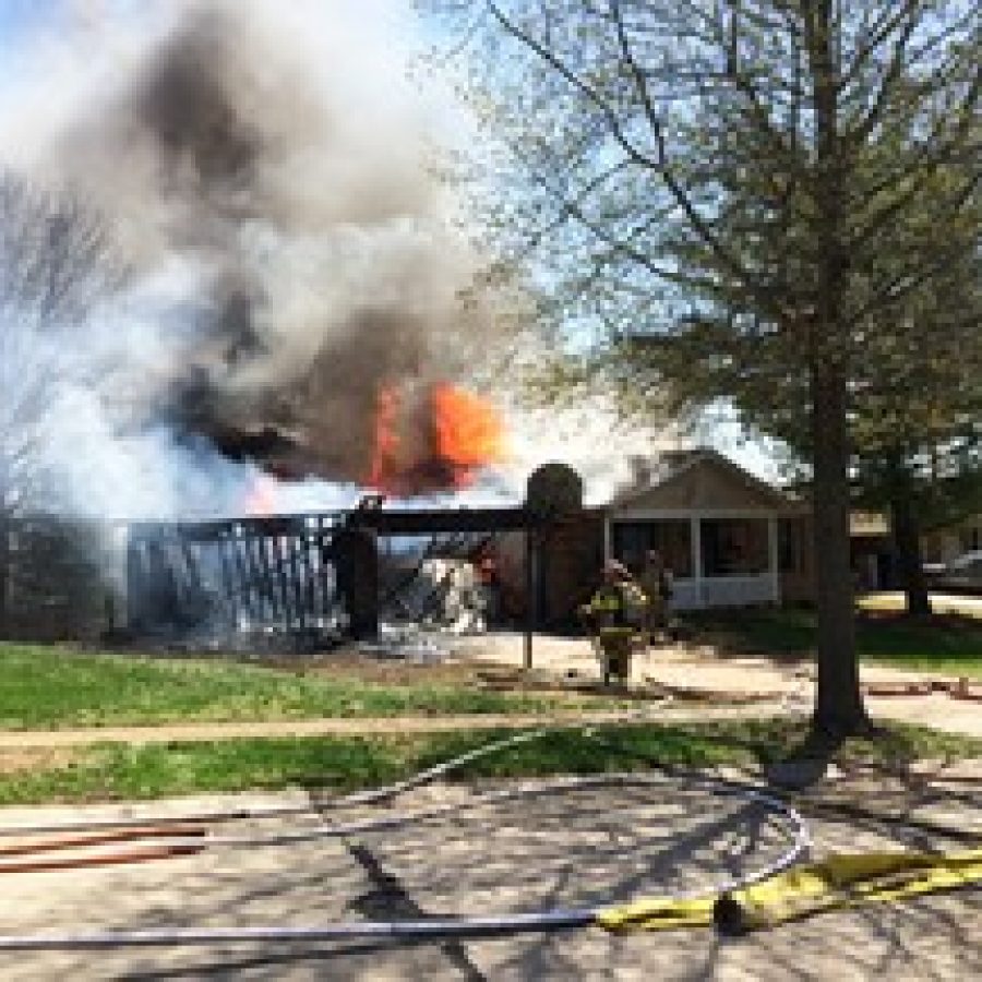 Crews from the Mehlville Fire Protection District and the Rock Community Fire Protection District responded to this house fire at roughly 12:06 p.m. Friday in the 5800 block of Falcon View Lane in Oakville. Photo ©2015 David Gruber/davidjstudios photography 