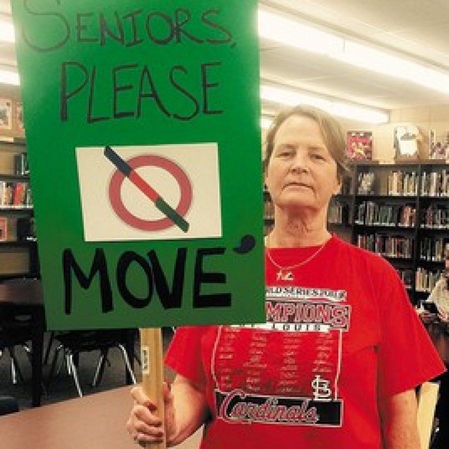 Linda Bowen campaigning against Prop R at a Board of Education workshop in October.