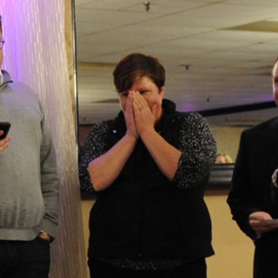 Mehlville-Oakville United Committee organizers, from left, Mark Haefner, Kimberly Hanan-West, Treasurer Kevin Schartner and Peggy Hassler, after the announcement at the Prop R victory that the ballot measure passed with nearly 73 percent of the vote.