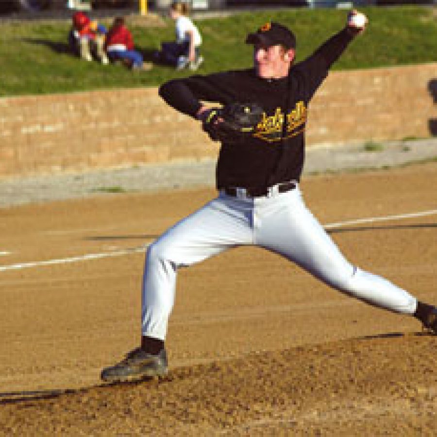 Oakville Senior High School pitcher Eric Brewer displays his winning form during the Tigers 18-1 win over Fox last Friday evening.