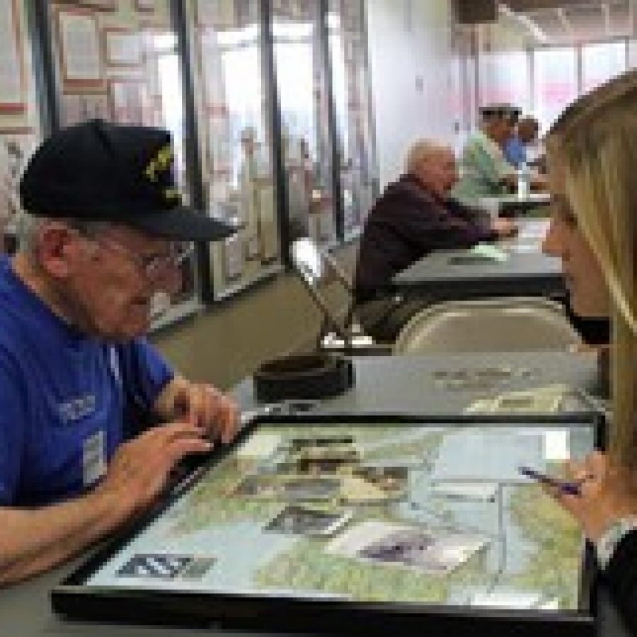 Winfred Wimpy Kenner shares photos and a map of where he served with a Lindbergh High School student during History Alive March 15. Kenner served in the Army from 1943 to 1945. 