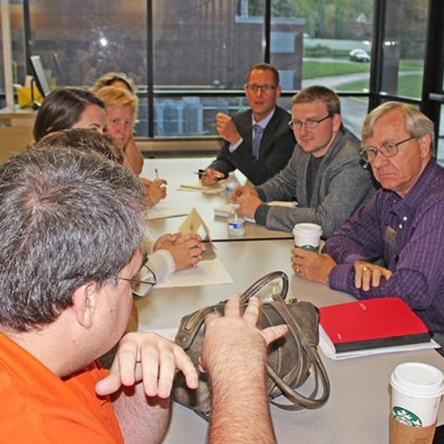 At the Mehlville Board of Educations first-ever listening session last week, from top, Assistant Superintendent Jeff Bresler and board members Jamey Murphy and Larry Felton discuss the mold at Mehlville High School with parents including Finance Committee member Kevin Summers, foreground.