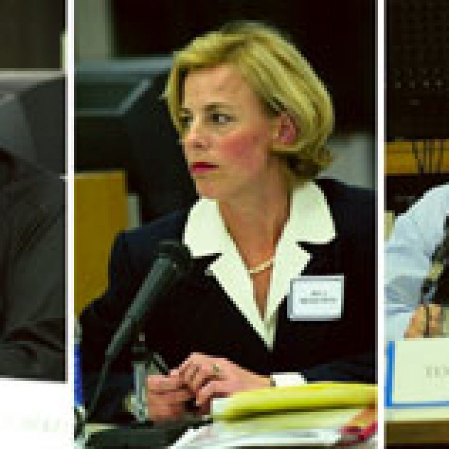 Three candidates seeking two seats on the Mehlville Board of Education in the April 6 election respond to questions during a forum sponsored by the school districts Citizens Advisory Committee. The candidates, shown as they were seated at the forum, from left, are: Karl Frank Jr., incumbent Rita Diekemper and Tom Correnti.Bill Milligan photos