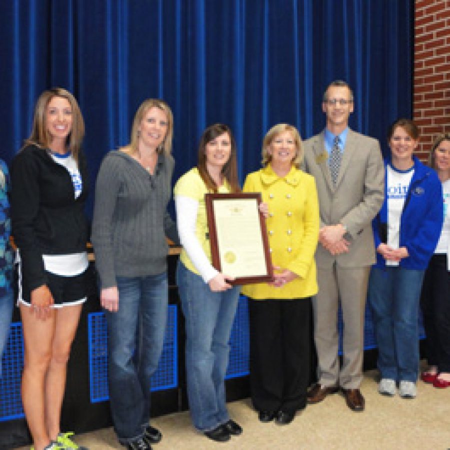 Rep. Marsha Haefner presented a House resolution to members of Point Elementary Schools Character Education Committee in recognition of Point being named a Missouri School of Character. Pictured, from left, are: Cathy Navarro, Jamie Stege, Jenn Koenig, April Kedro, Haefner,
Mehlville Superintendent Eric Knost, Dara Howard, Tamie Stinson and
Dee Courtois.