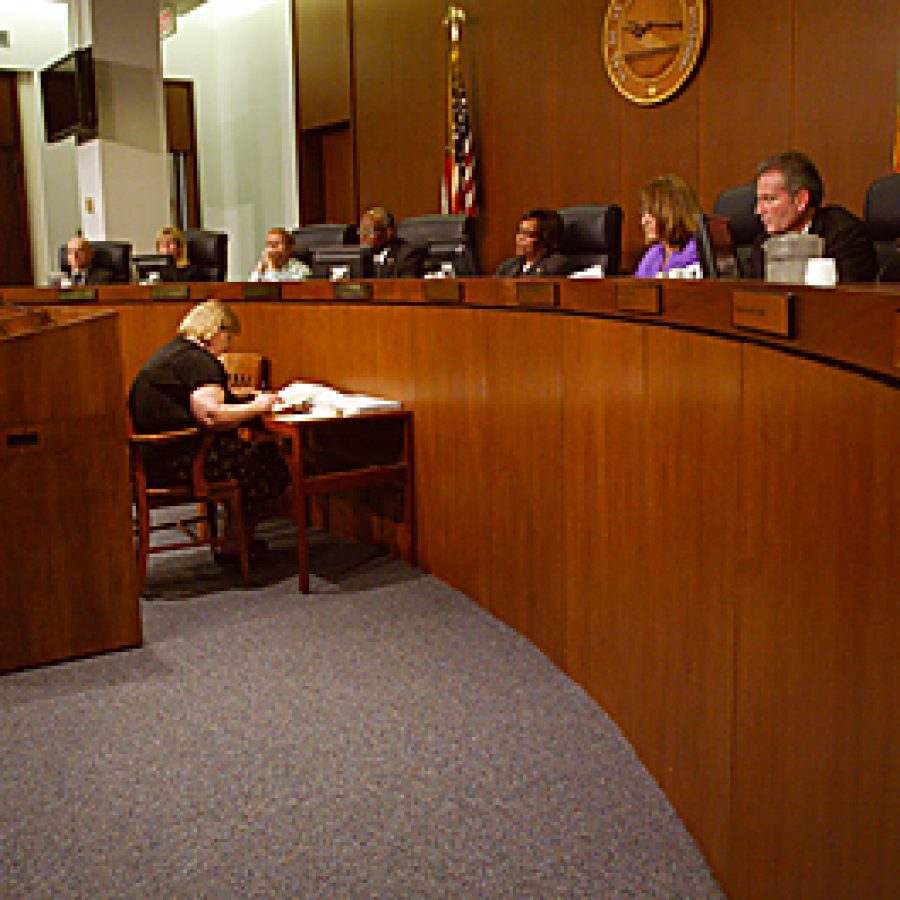 Maryland Heights City Clerk Jan Telthorst, left, addresses the County Council last week about the negative impact a proposed ban on public smoking would have on her community. A countywide public smoking ban referendum may be considered by voters in November. Bill Milligan photo