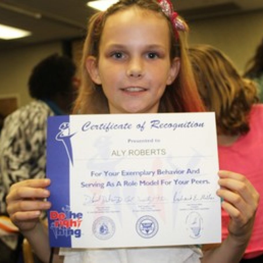 Forder Elementary School fourth-grader Aly Roberts displays the certificate she was awarded at Tuesdays Do The Right Thing recognition ceremony.
 